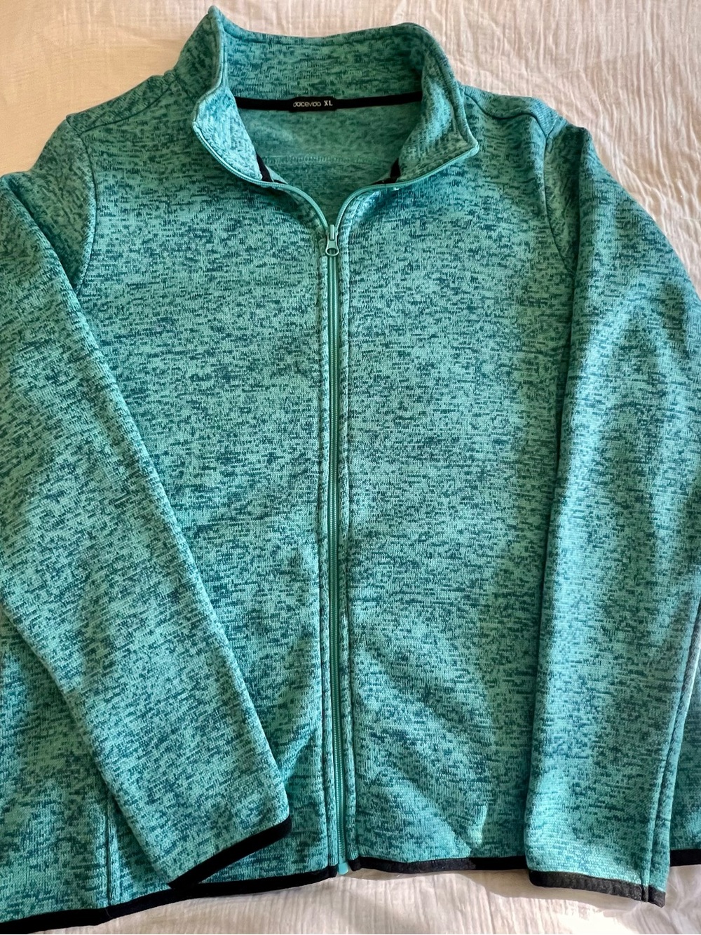 Athletic zip up jacket with pockets.